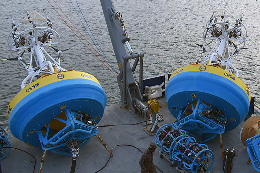 Two large ocean buoys on a ship