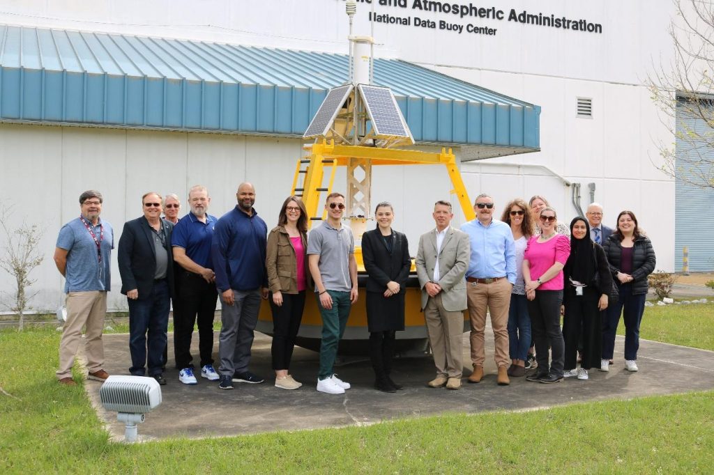 The NOAA Office of Research, Transition, and Application team with NDBC site host Dr. Bill Burnett